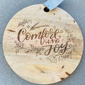 Crofton Comfort and Joy Mango wood holiday charcuterie board with display tag
